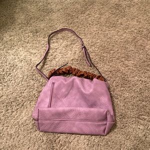 no brand. purple and brown cross-body bag.